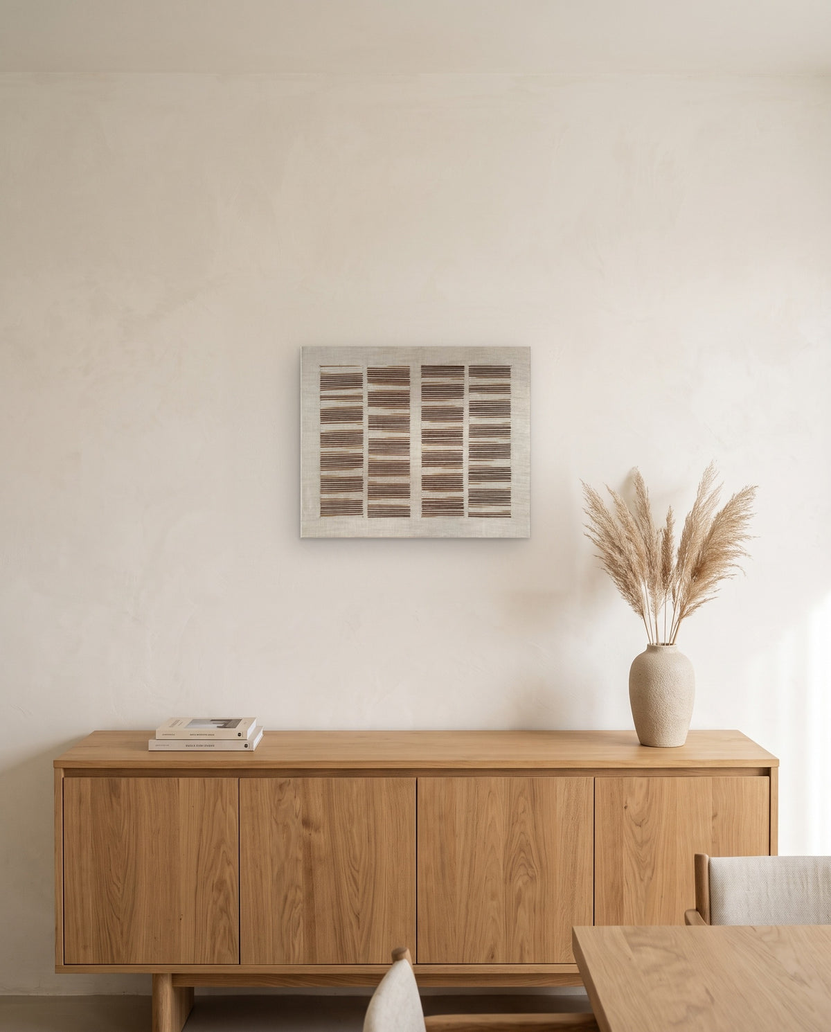 Andante hung horizontally above a light oak sideboard with a ceramic vase of dried pampas grass. AI-assisted lifestyle image: the setting is illustrative and the canvas is our real product photo; please refer to our real product photographs for the actual item’s details.