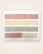 Cadence by Nyra Atelier, hand-embroidered textile wall art: four rows of wool stitches in red, mustard, olive green and blush on white canvas