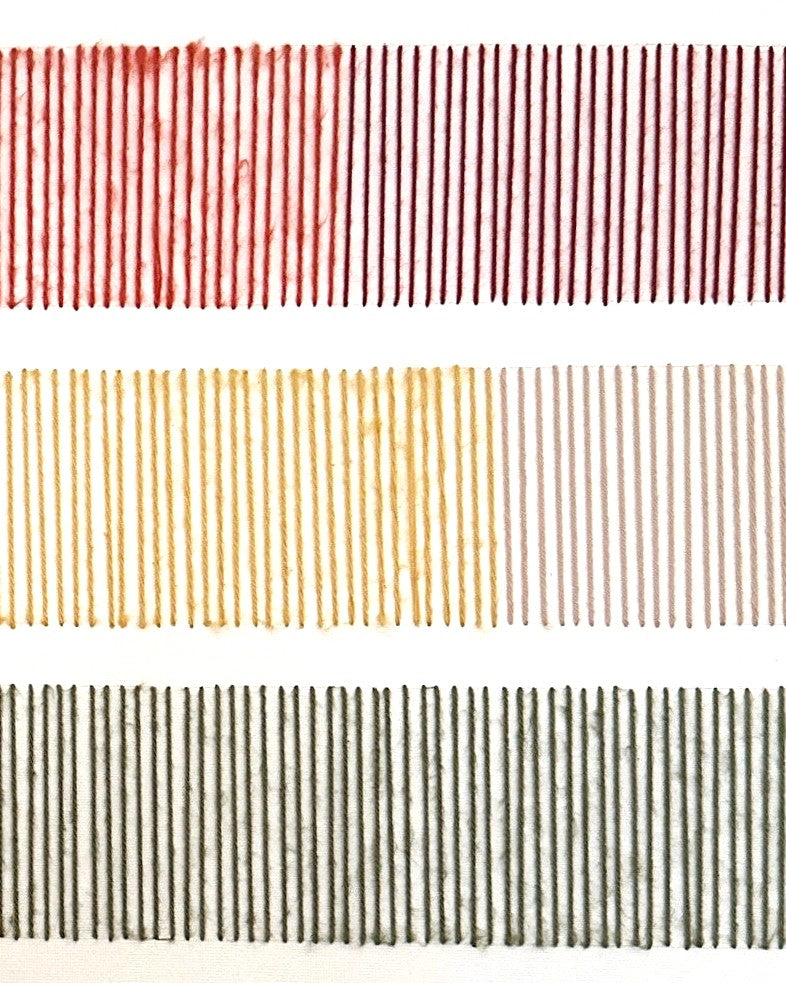 Close-up of Cadence: vertical wool stitches in red, mustard and olive green, embroidered by hand on canvas