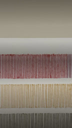 Video: close-up of the stitched wool rows on Cadence, in red and mustard