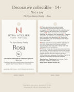 Hang tag of Rosa by Nyra Atelier: decorative collectible for collectors aged 14+, not a toy, with materials and care