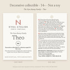 Hang tag of Theo by Nyra Atelier: decorative collectible for collectors aged 14+, not a toy; materials, care and maker details